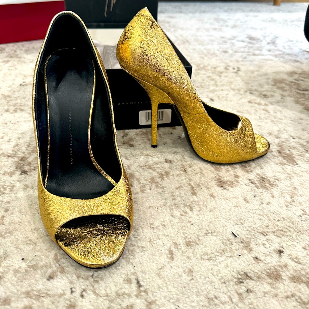 Giseppo Zanotti gold heels.